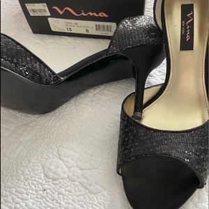 Black dressy heels. Never worn.